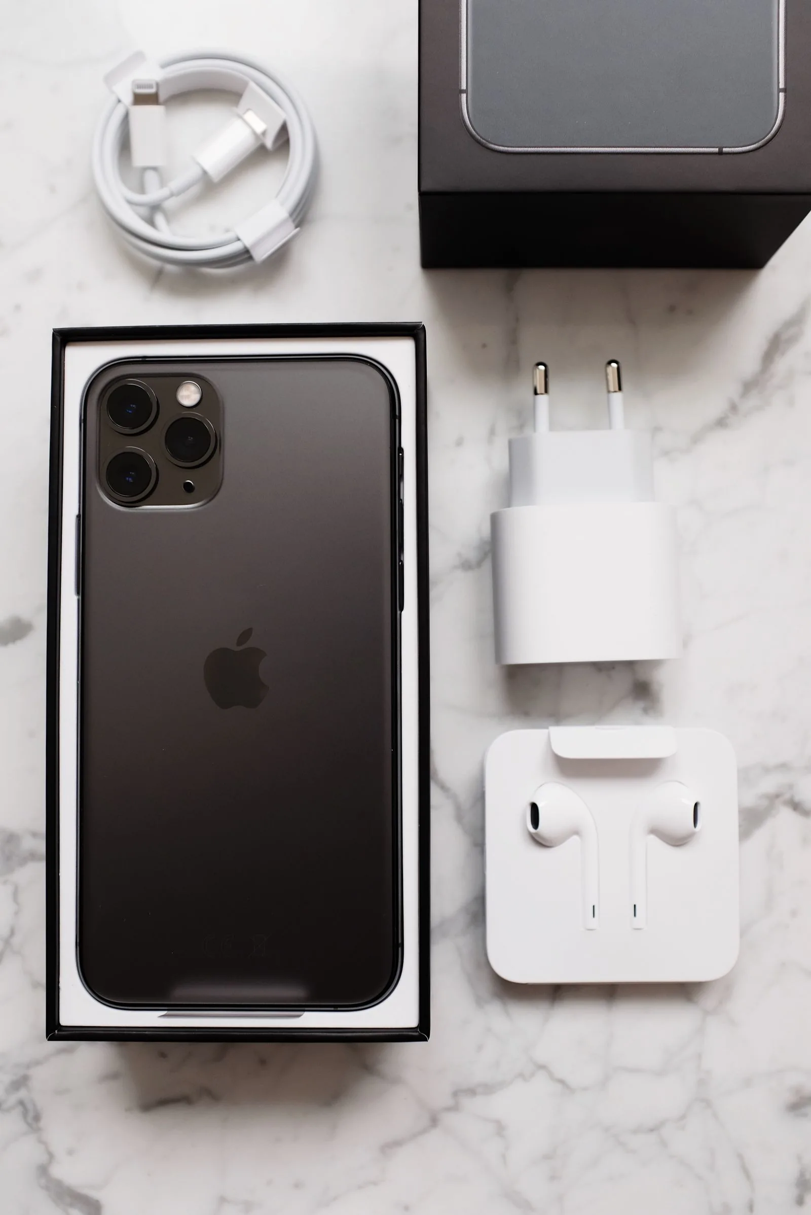 Real photograph of mobile phone and everyday accessories