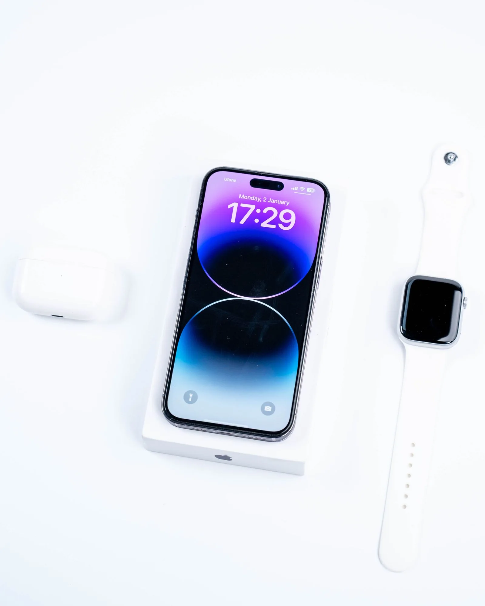 Smartphone, wireless earbuds and smart watch