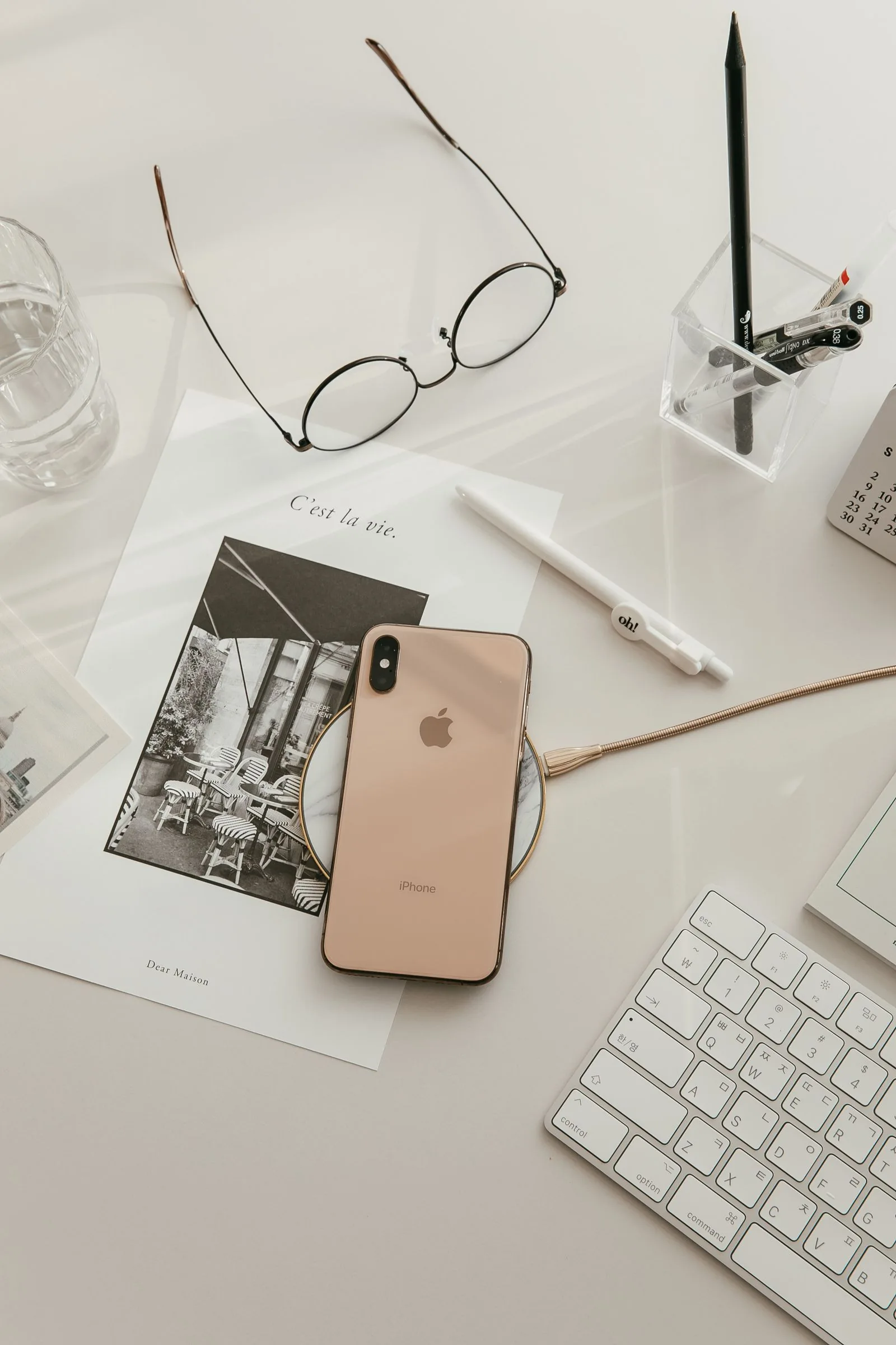 Phone beside a modern digital workspace