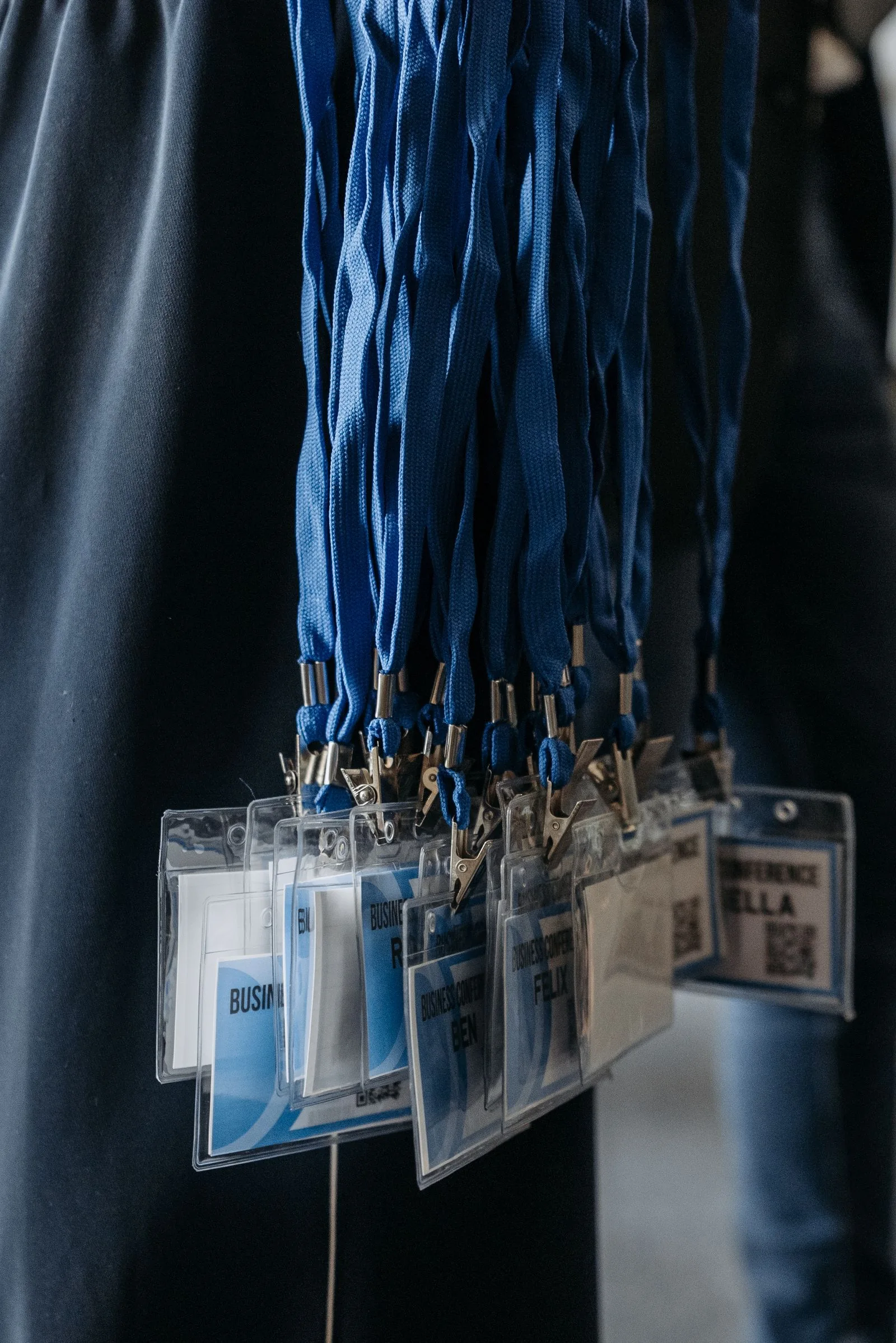 Printed ID cards hanging from lanyards